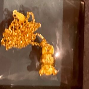 Elegant Gold Pendant  La bou bou Necklace.